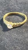 18ct gold, solitaire diamond ring set with 2 diamo