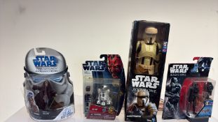 Group of 4 boxed Star Wars action figures