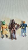 Three Star Wars action figures: Chewbacca, Squid Head and Blue Snaggletooth, Kenner