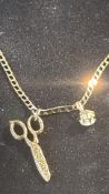 9ct gold chain with two pendants. 47cm. 5 grams