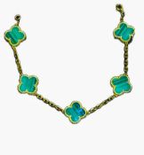 In the style of Van Cleef & Arples 18ct yellow gol