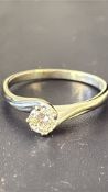 18ct White gold ring set with solitaire diamond We