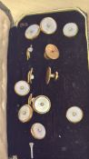Yellow metal & mother of pearl cased set of studs