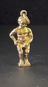 9ct Gold pendant figure of a boy Weight 3.1g