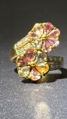 9ct Gold ring set with multicolour sapphire & diam