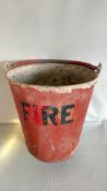 Vintage red metal fire bucket