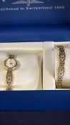 Ladies Gold Plated watch and bracelet set in box w