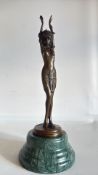 Bronze topless Medusa figure on marble base
