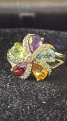 9ct Gold ring set with multicoloured gem stones &