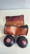 Pair of lawn bowls with carry case