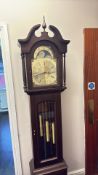 Longcase clock with brass moonphase dial