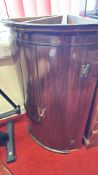 Mahogany Georgian bow-front corner cupboard