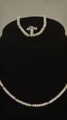 Pearl necklace & pearl bracelet both set with 14ct gold together with pearl cross pendant set in 9ct