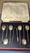 Cased set of silver bean spoons