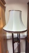 Chinoiserie-decorated mahogany standard lamp with fabric shade