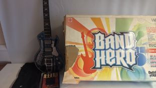 Paper Jamz Pro Series toy guitar with effects module and Wii Band Hero band-kit box