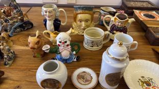 Group of novelty ceramic jugs, mugs and commemorative ware