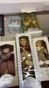 Collection of boxed porcelain and character dolls