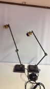Pair of black metal and brass adjustable desk lamps