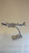 Chrome spitfire plane on stand