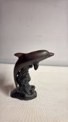 Bronze dolphin sculpture