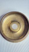 Brass dish with Afars and Issas 100F coin