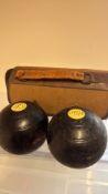 Pair of lawn bowls with carry case