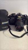 Yashica FX-3 35 mm SLR camera with ML Zoom lens and case
