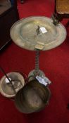 Group of patinated brass lamp, ashtray stand and coal scuttle