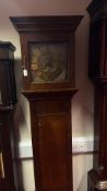 Oak longcase clock with brass dial