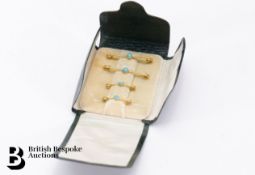 A set of 18ct Gold and Turquoise Pins