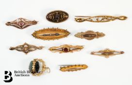 Eight 9ct Gold Victorian and Edwardian Brooches