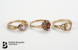 Three 9ct gold rings, including amethyst and diamond size O, quartz ring size O, garnet and cubic