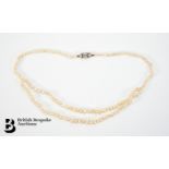 Part Double Strand Pearl Necklace