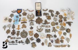 Quantity of Cap Badges and Helmet Plates