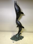 A BRONZED SCULPTURE OF TWO DOLPHINS LEAPING FROM WAVES, HEIGHT 52CM