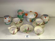 A VINTAGE MABEL LUCIE ATTWELL SHELLEY CERAMIC THREE PIECE TEA SET, INCLUDING; 'BOO BOO' PIXIE MILK
