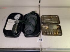 VINTAGE MEDICAL KIT WITH A VINTAGE BLOOD PRESSURE MACHINE