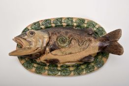 A covered fish platter with base "Fish"