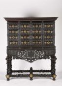 A cabinet with ten drawers simulating sixteen four legs and six feet stand