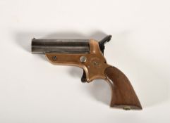 A four-barrel pocket pistol - Sharps system