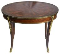 A French Louis XVI style parquetry and marquetry inlaid oval low table