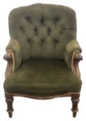 An early Victorian mahogany button back upholstered armchair
