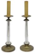 A pair of French gilt brass and cut glass column table lamps
