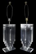 A large and impressive pair of 1970s lucite table lamps