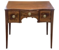 A George III serpentine fronted kneehole dressing table
