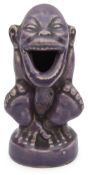 After Blanche Vulliamy (1869-1923) A grotesque figural match holder in the Devon pottery style, earl
