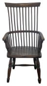 A late Georgian style ash and elm comb-back Windsor armchair