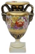An early 19th century Miles Mason porcelain ram's heaaded twin-handled vase