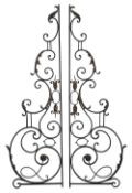 A pair of wrought iron garden gates